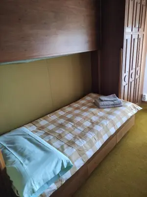 Ein Bett oder Betten in einem Zimmer der Unterkunft Bellevue Crans-Montana