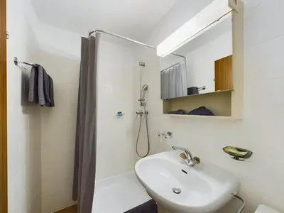 Ein Badezimmer in der Unterkunft Panorama hideaway apartment near Zermatt with parking!
