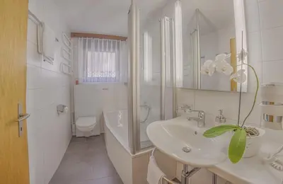 Ein Badezimmer in der Unterkunft Apartments Bergrose