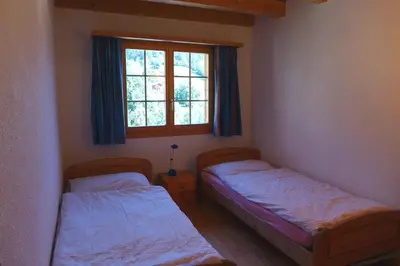 Ein Bett oder Betten in einem Zimmer der Unterkunft Wohnung mit 4 Schlafzimmer