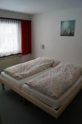 Ein Bett oder Betten in einem Zimmer der Unterkunft Apartment Azalea by Interhome