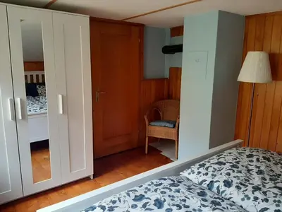 Ein Bett oder Betten in einem Zimmer der Unterkunft Gemütliches Chalet