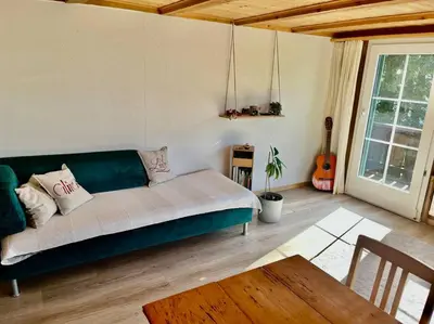 Ein Sitzbereich in der Unterkunft Chalet Sonnenheim, Wohnung mit Panoramafenster
