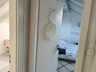 Ein Bett oder Betten in einem Zimmer der Unterkunft Les coeurs brisés