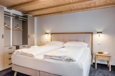 Ein Bett oder Betten in einem Zimmer der Unterkunft Chalet Eiger View - GRIWA RENT