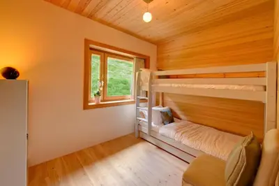 Ein Bett oder Betten in einem Zimmer der Unterkunft Chalet Chloe - Saas-Fee