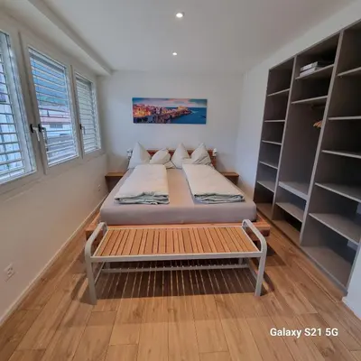 Ein Bett oder Betten in einem Zimmer der Unterkunft Mountain-Lake Apartment 2