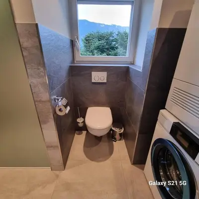 Ein Badezimmer in der Unterkunft Mountain-Lake Apartment 2