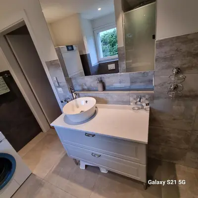 Ein Badezimmer in der Unterkunft Mountain-Lake Apartment 2