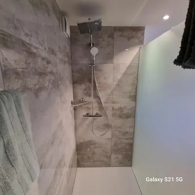 Ein Badezimmer in der Unterkunft Mountain-Lake Apartment 2