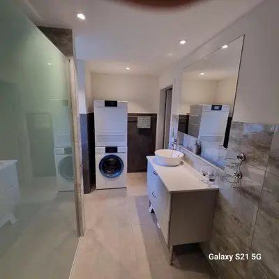 Ein Badezimmer in der Unterkunft Mountain-Lake Apartment 2
