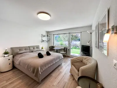 Ein Bett oder Betten in einem Zimmer der Unterkunft Studio Marmotta - Zermatt