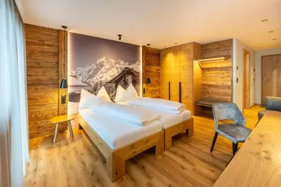 Ein Bett oder Betten in einem Zimmer der Unterkunft Mountain Lodge