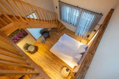 Ein Bett oder Betten in einem Zimmer der Unterkunft Mountain Lodge