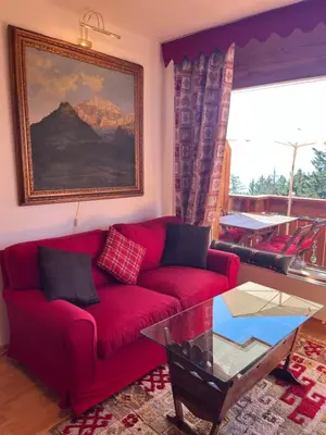 Ein Sitzbereich in der Unterkunft La casetta di Crans