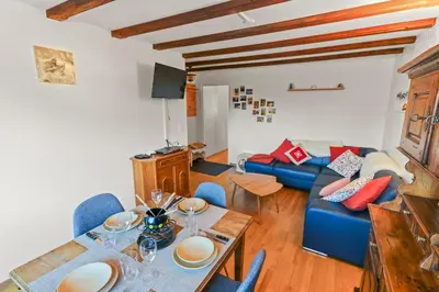 Ein Sitzbereich in der Unterkunft Magnifique appartement à côté des remontées mécaniques