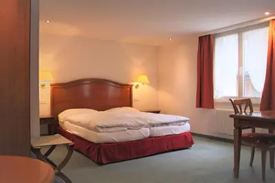 Ein Bett oder Betten in einem Zimmer der Unterkunft Self-Service Guesthouse Berggeist