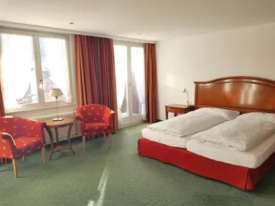 Ein Bett oder Betten in einem Zimmer der Unterkunft Self-Service Guesthouse Berggeist