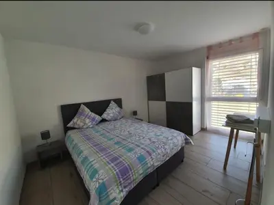 Ein Bett oder Betten in einem Zimmer der Unterkunft Jacqueline residence