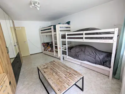 Ein Bett oder Betten in einem Zimmer der Unterkunft Petit Trianon 1,3 - Grosses Familiennest komplett renoviert