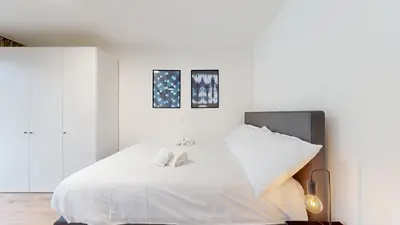 Ein Bett oder Betten in einem Zimmer der Unterkunft Bright & modern apartments in Sion