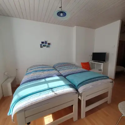 Ein Bett oder Betten in einem Zimmer der Unterkunft Josy's Home Zermatt