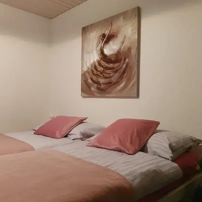 Ein Bett oder Betten in einem Zimmer der Unterkunft Josy's Home Zermatt