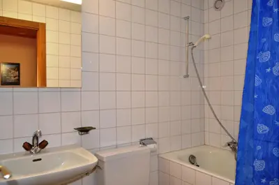 Ein Badezimmer in der Unterkunft Immeuble Les Mélèzes