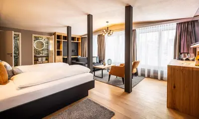 Ein Bett oder Betten in einem Zimmer der Unterkunft Hotel Piz Badus