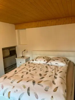 Ein Bett oder Betten in einem Zimmer der Unterkunft Römerhaus