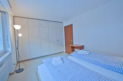Ein Bett oder Betten in einem Zimmer der Unterkunft Haus Matten, Apartment Birch