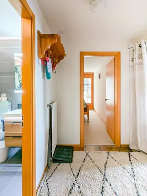 Ein Bett oder Betten in einem Zimmer der Unterkunft Centered Ski/Swim Ap. w/ private yard & fireplace