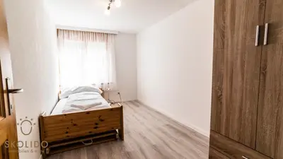 Ein Bett oder Betten in einem Zimmer der Unterkunft Gemütliches Ferienhaus Brigerbad