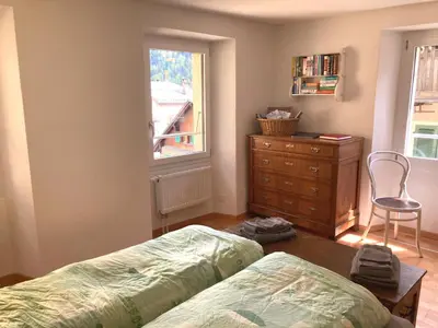 Ein Bett oder Betten in einem Zimmer der Unterkunft Appartamento Evelina