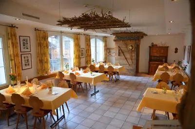 Ein Restaurant oder anderes Speiselokal in der Unterkunft Hotel Arkanum