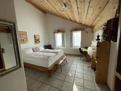 Ein Bett oder Betten in einem Zimmer der Unterkunft Hotel Arkanum