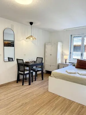 Ein Bett oder Betten in einem Zimmer der Unterkunft Central Zermatt Hideaway