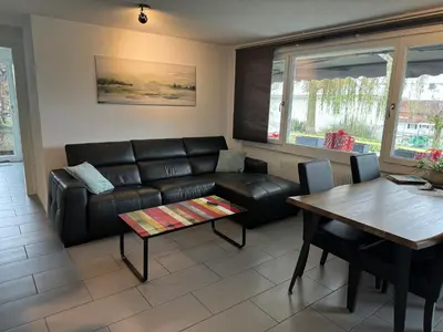Ein Sitzbereich in der Unterkunft See und Berge Garden