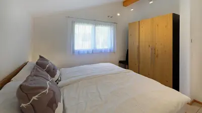 Ein Bett oder Betten in einem Zimmer der Unterkunft Chalet Michelangelo
