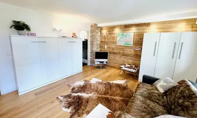 Ein Sitzbereich in der Unterkunft Chalet-Studio Europe 7