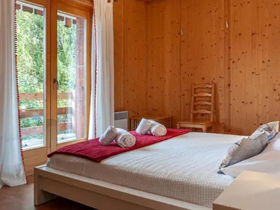 Ein Bett oder Betten in einem Zimmer der Unterkunft Chalet Sneachta by Interhome