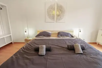 Ein Bett oder Betten in einem Zimmer der Unterkunft Charmant appartement au centre