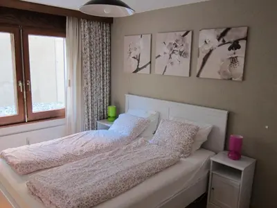 Ein Bett oder Betten in einem Zimmer der Unterkunft Apartment Lauber, Haus Wichje A, Zermatt