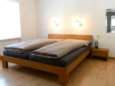 Ein Bett oder Betten in einem Zimmer der Unterkunft Ferienwohnung Pirata Zermatt