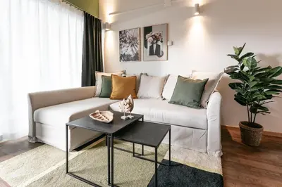 Ein Sitzbereich in der Unterkunft Spirit Apartments Suites