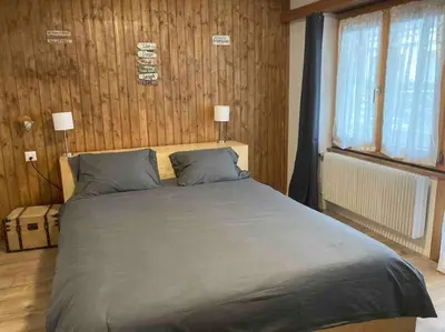 Ein Bett oder Betten in einem Zimmer der Unterkunft Appartement at the heart of Saas Fee