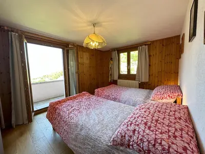 Ein Bett oder Betten in einem Zimmer der Unterkunft Perfect Mountain Condo - 4 Valleys - Swiss Alps