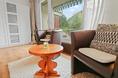 Ein Sitzbereich in der Unterkunft Charmant studio ouvert avec vue paisible