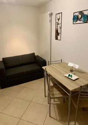 Ein Sitzbereich in der Unterkunft La Chaumière d'Hérens