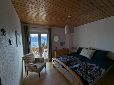 Ein Bett oder Betten in einem Zimmer der Unterkunft Chalet Cactus - 4 Vallées